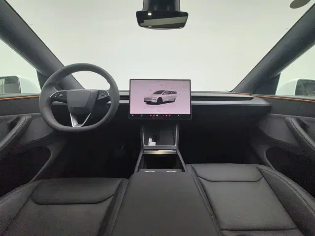 Tesla Model Y — Фото автомобиля 5