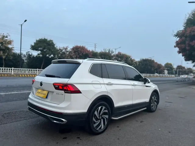 Volkswagen Tiguan L — Фото автомобиля 5