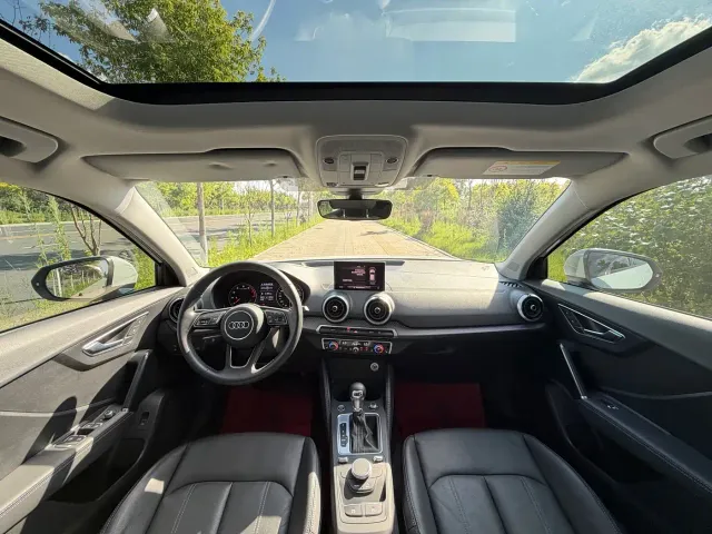 Audi Q2L — Фото автомобиля 10