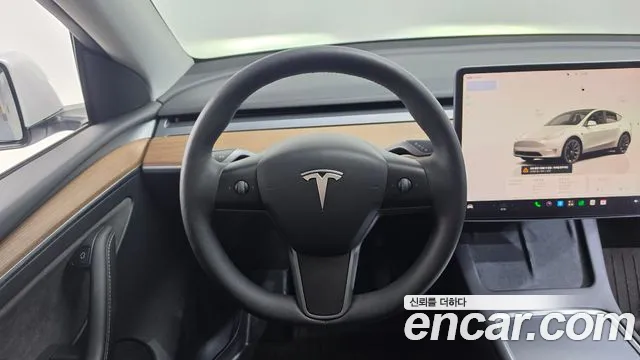Tesla Model Y — Фото автомобиля 14