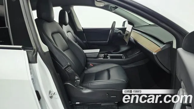 Tesla Model Y — Фото автомобиля 16