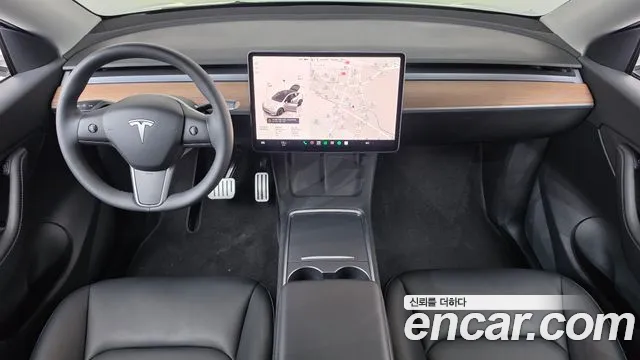 Tesla Model Y — Фото автомобиля 7