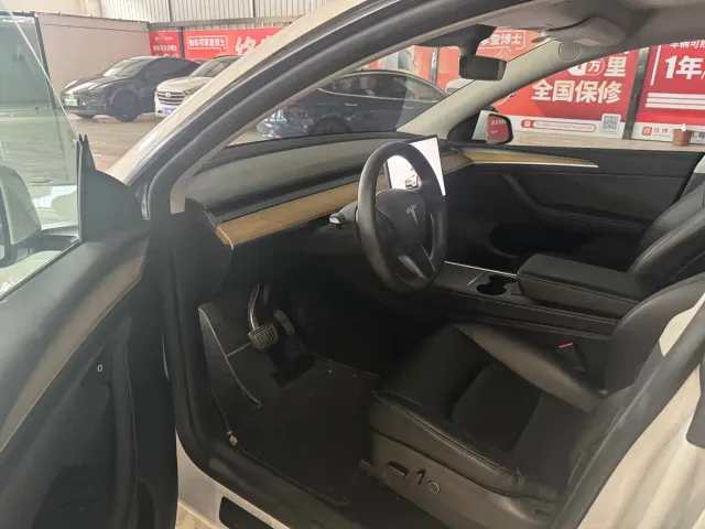 Tesla Model Y — Фото автомобиля 7