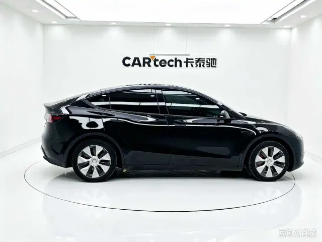 Tesla Model Y — Фото автомобиля 7