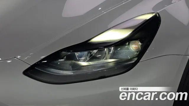 Tesla Model Y — Фото автомобиля 7