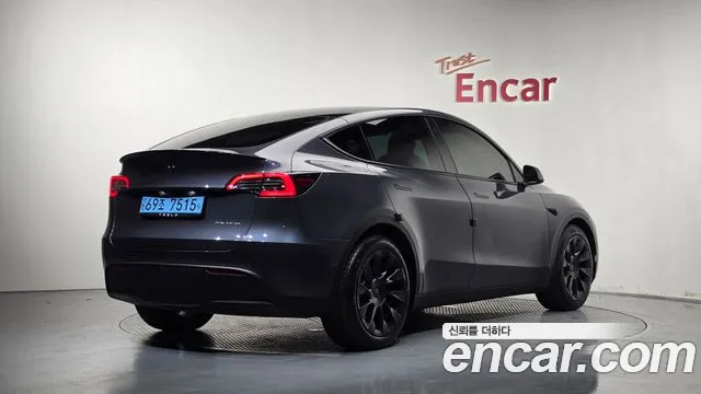 Tesla Model Y — Фото автомобиля 2