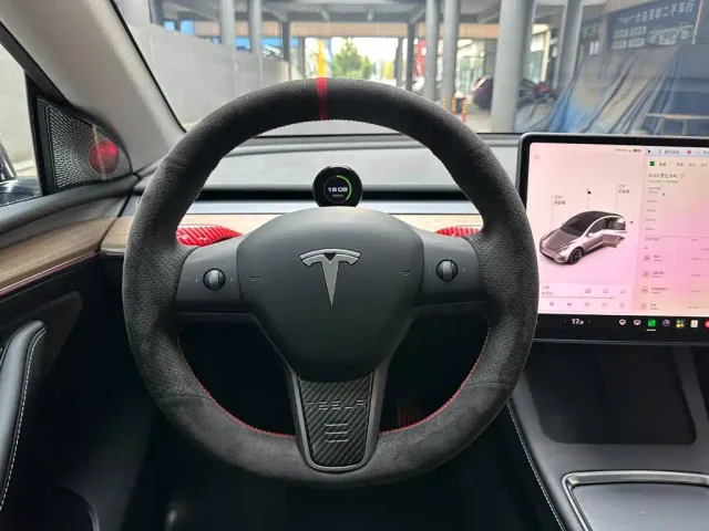 Tesla Model Y — Фото автомобиля 12
