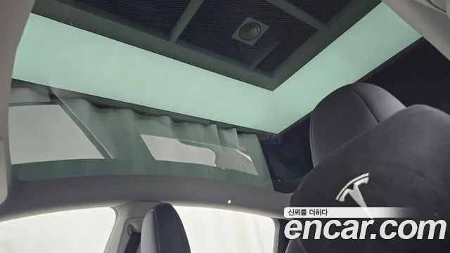 Tesla Model Y — Фото автомобиля 29