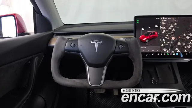Tesla Model Y — Фото автомобиля 19