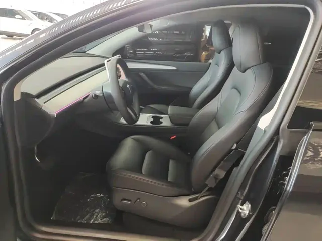 Tesla Model Y — Фото автомобиля 14