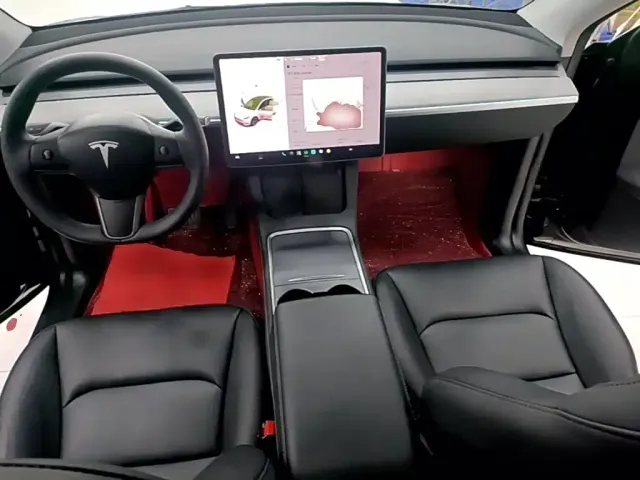 Tesla Model Y — Фото автомобиля 9