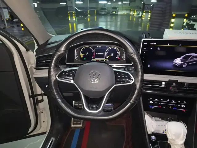 Volkswagen Tiguan L — Фото автомобиля 12
