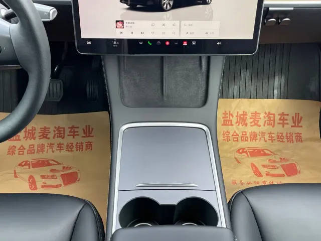 Tesla Model Y — Фото автомобиля 13