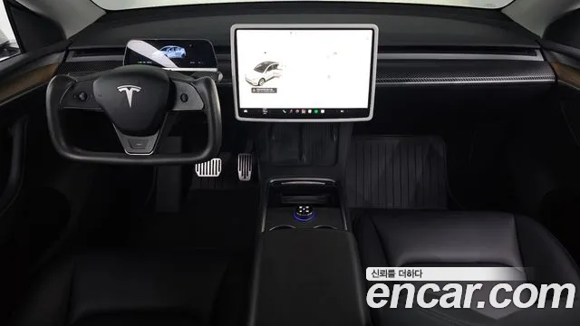 Tesla Model Y — Фото автомобиля 6