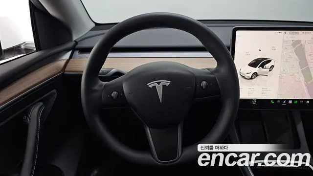 Tesla Model Y — Фото автомобиля 13