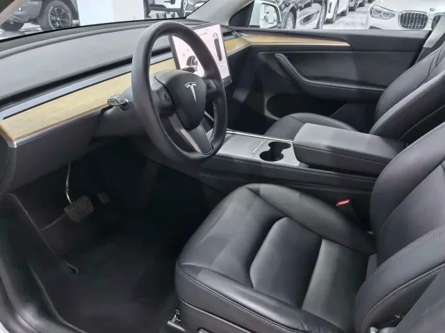 Tesla Model Y — Фото автомобиля 7