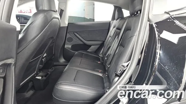 Tesla Model Y — Фото автомобиля 4