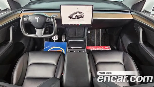 Tesla Model Y — Фото автомобиля 7