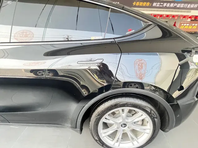 Tesla Model Y — Фото автомобиля 7