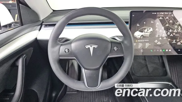 Tesla Model Y — Фото автомобиля 12