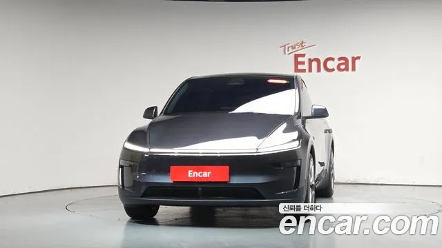 Tesla Model Y — Фото автомобиля 3