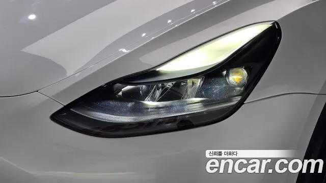 Tesla Model Y — Фото автомобиля 21