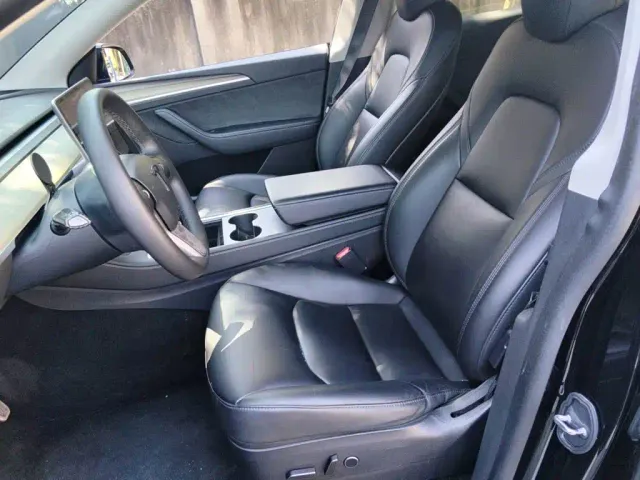 Tesla Model Y — Фото автомобиля 16