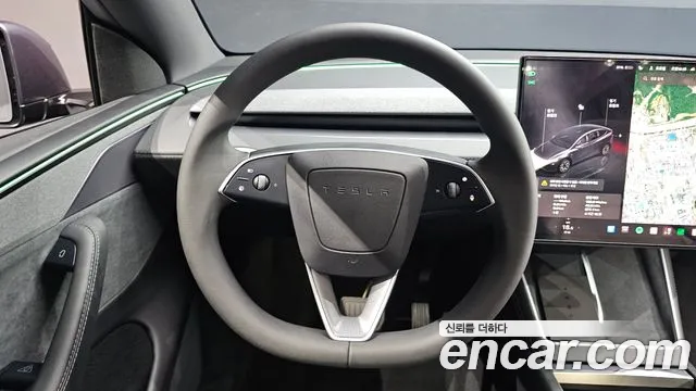 Tesla Model Y — Фото автомобиля 12