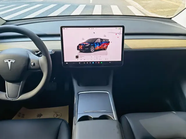 Tesla Model Y — Фото автомобиля 8