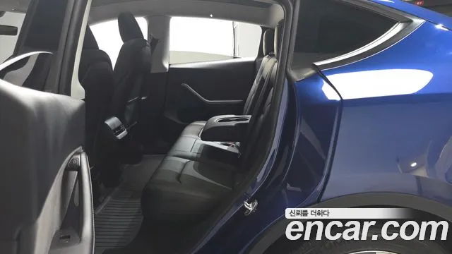 Tesla Model Y — Фото автомобиля 18