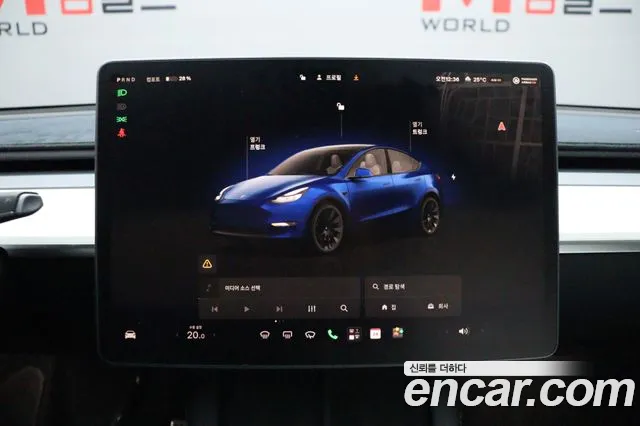 Tesla Model Y — Фото автомобиля 14