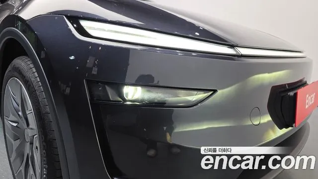 Tesla Model Y — Фото автомобиля 7