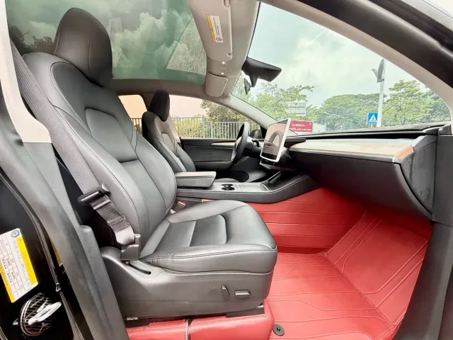 Tesla Model Y — Фото автомобиля 11