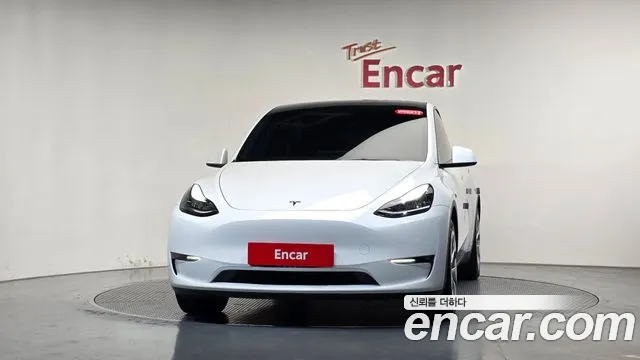Tesla Model Y — Фото автомобиля 3