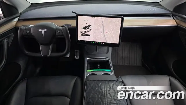 Tesla Model Y — Фото автомобиля 10