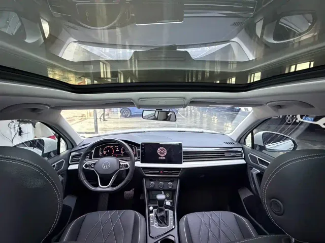 Volkswagen Tiguan L — Фото автомобиля 11