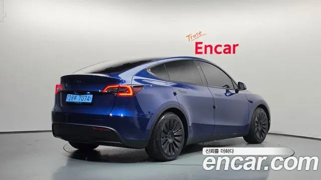 Tesla Model Y — Фото автомобиля 2
