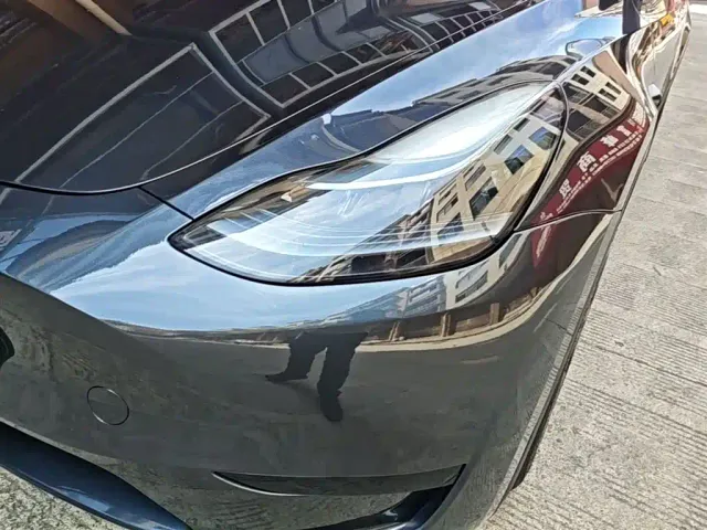 Tesla Model Y — Фото автомобиля 23