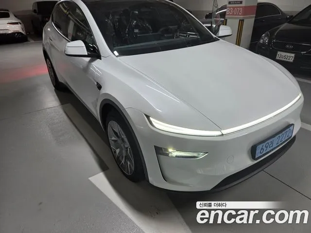 Tesla Model Y — Фото автомобиля 8