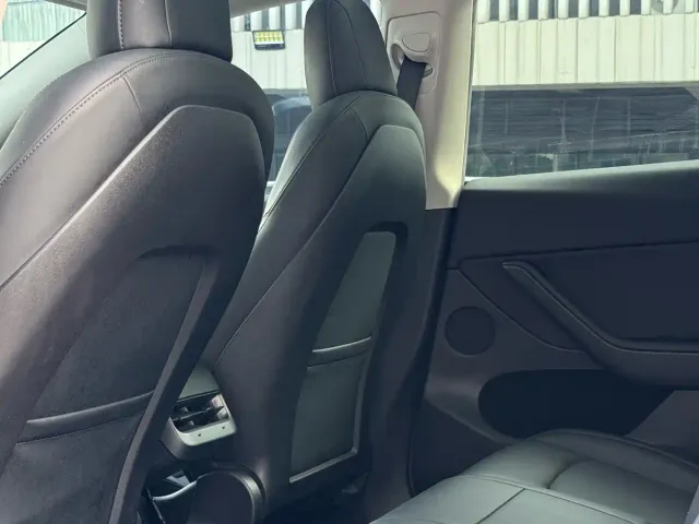 Tesla Model Y — Фото автомобиля 6