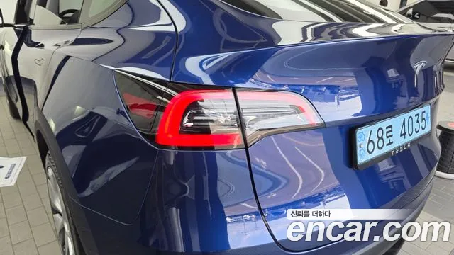 Tesla Model Y — Фото автомобиля 8