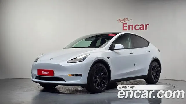 Tesla Model Y — Фото автомобиля 10