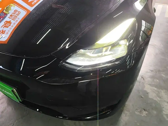 Tesla Model Y — Фото автомобиля 23