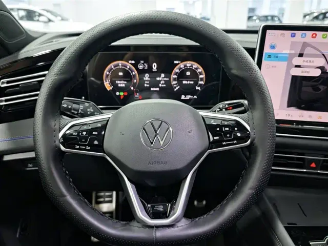Volkswagen Tiguan L — Фото автомобиля 11