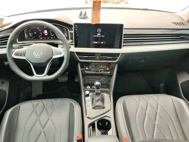 Volkswagen Tiguan L — Фото автомобиля 9