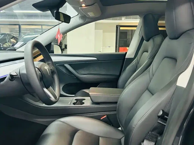 Tesla Model Y — Фото автомобиля 7