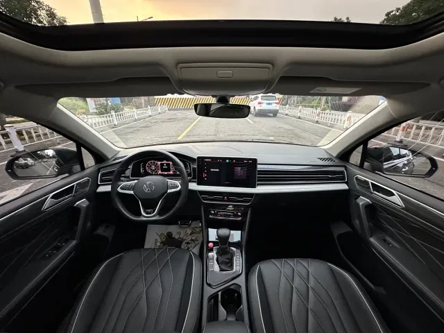 Volkswagen Tiguan L — Фото автомобиля 5