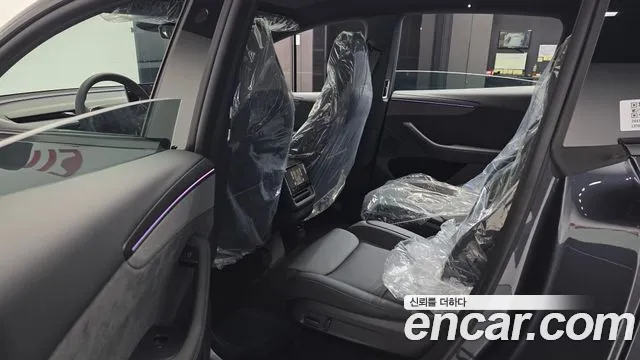 Tesla Model Y — Фото автомобиля 26