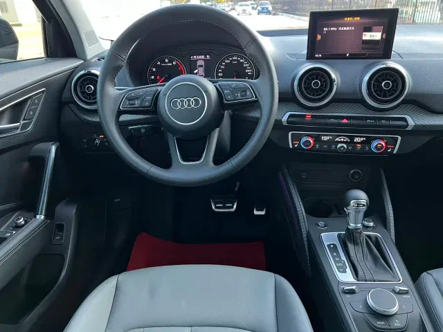 Audi Q2L — Фото автомобиля 13