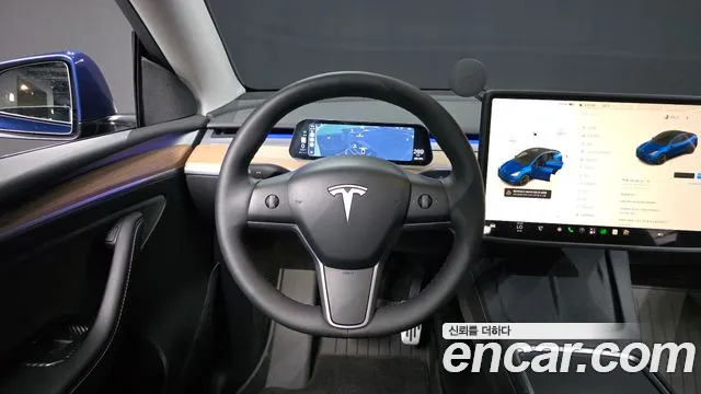 Tesla Model Y — Фото автомобиля 19